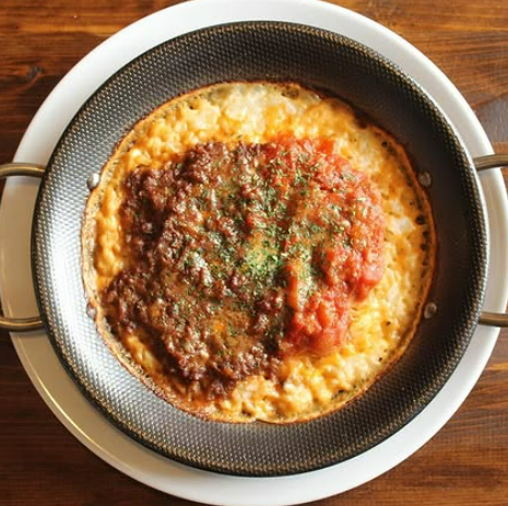 Enjoy exquisite Italian cuisine in a casual setting with a glass of wine.
