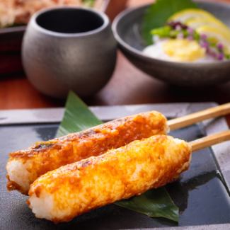 1 piece of Kiritanpo with green onion and miso