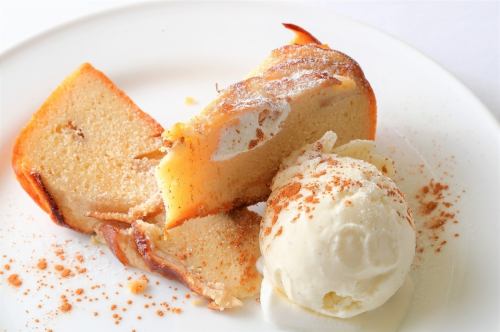 Warm apple baked cake with vanilla ice cream