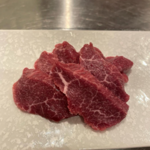 Raw lamb shoulder loin