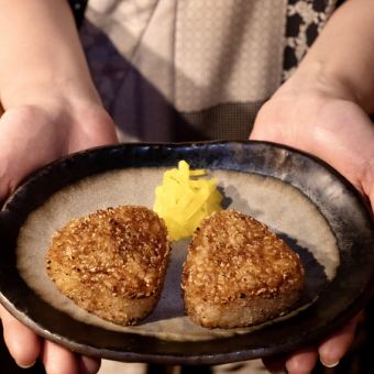 Onigiri (2 small) cooked in Japanese-style soup stock
