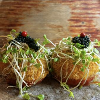Deep fried risotto topped with caviar (1 small portion) - even if it means going into the red