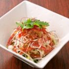 Intestines and spring onion flowers with pepper