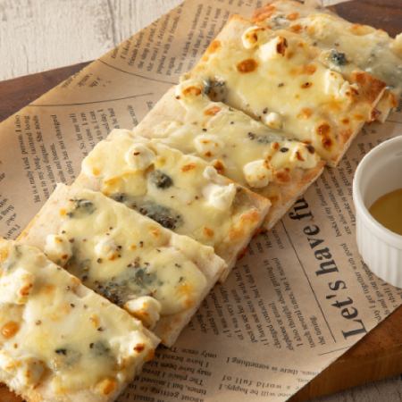 Bran pizza with four kinds of cheese and honey