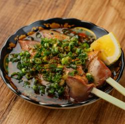 Grilled raw liver with green onions and sesame oil *