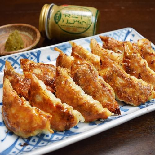 Please enjoy our many delicious dishes, including gyoza!
