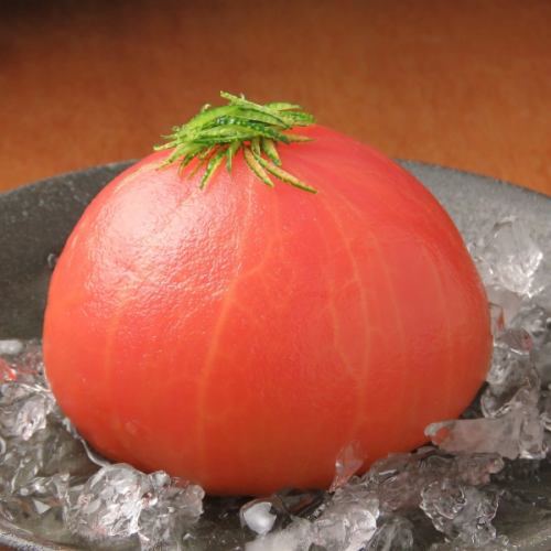 Whole tomato pickled in yuzu