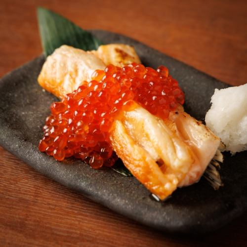 Salmon belly topped with salmon roe