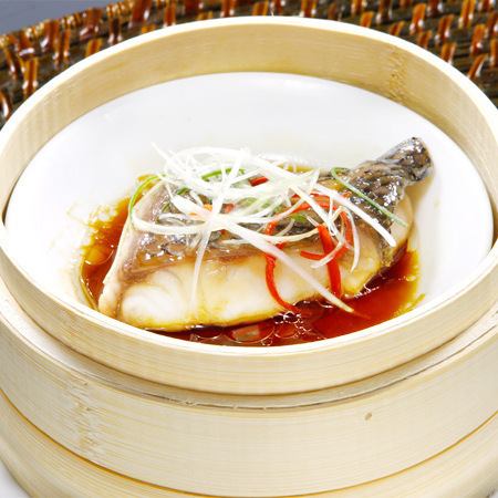 Steamed white fish with leek ginger sauce