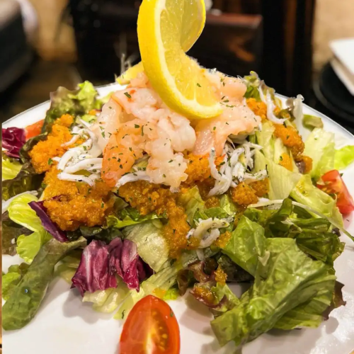 Plump shrimp, whitebait and homemade carrot dressing salad