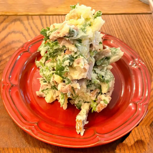 Adult potato salad with seasonal vegetables and smoked meat