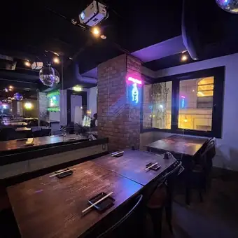 You can relax and enjoy your meal at our spacious table seating.