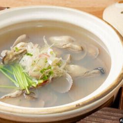 Steamed pufferfish and clams in sake