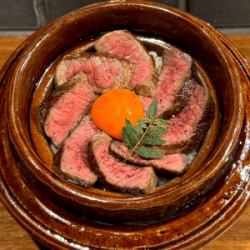 Grilled Wagyu beef topped with egg yolk