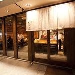 A stylish yakitori restaurant with wood grain