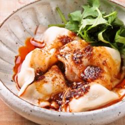 Boiled dumplings with garlic chili oil sauce 6 pieces