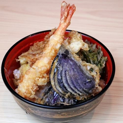 Bowl of rice and fried fish