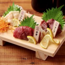 Three pieces of horse sashimi geta