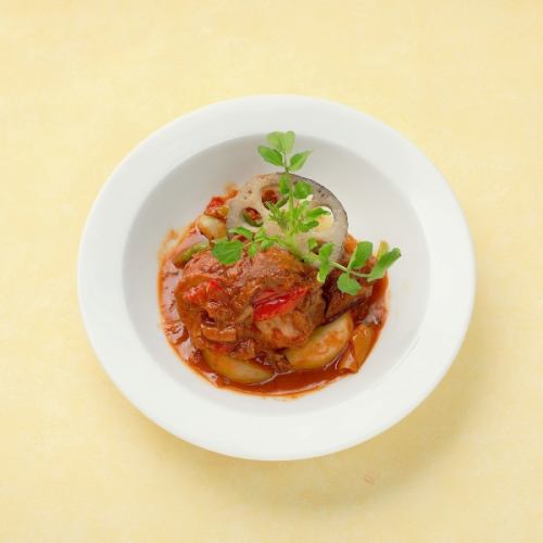 Pork in beer, tomato simmered with hot vegetables