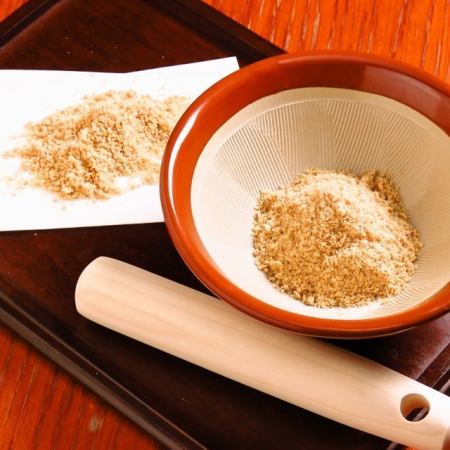 Grind the white sesame seeds finely and carefully to preserve the flavor.