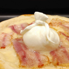 Homemade burrata cheese and bacon pizza