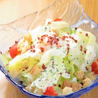 Caesar salad with hot balls