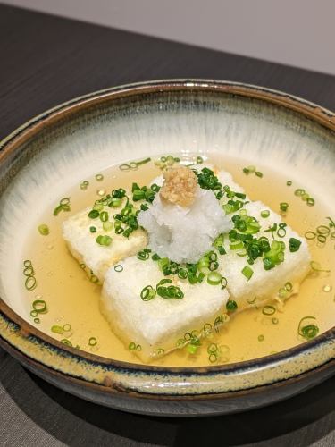 Fried tofu with local chicken broth