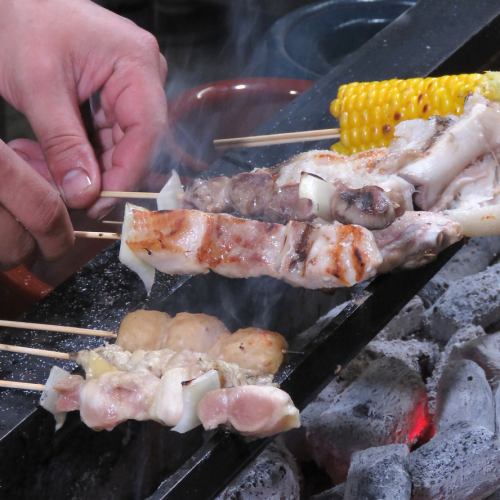 Skewer to carefully burn with charcoal carefully