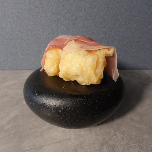 Camembert wrapped in prosciutto