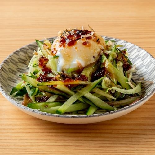 Myoga and cucumber topped with a soft-boiled egg