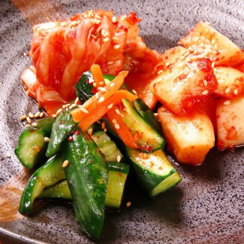 Three kinds of kimchi served