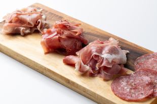 Assortment of all kinds of raw ham and salami