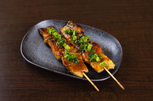 2 grilled pork belly skewers