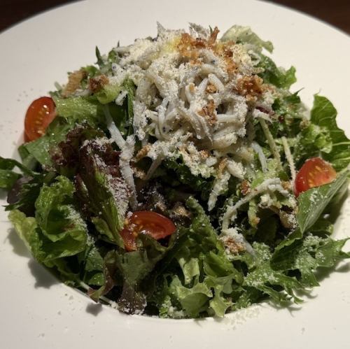 Green salad with whitebait and parmesan cheese