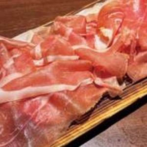 5. Freshly sliced prosciutto