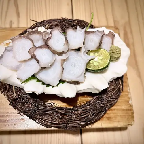 Island octopus sashimi, caught using the "one-shot headshot" method, from Motobu Town.