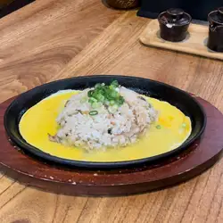 Garlic butter fried rice on a hot plate