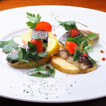 Grilled potatoes and mackerel lightly roasted with a burner