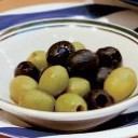 Two kinds of olives pickled in anchovy oil