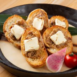 Grilled cream cheese and mackerel miso served with baguette