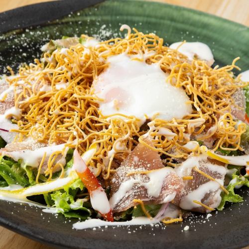 Crispy Caesar salad with raw ham and hot spring eggs