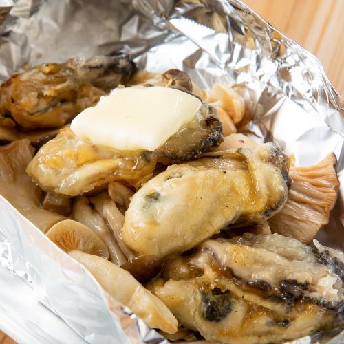 Aya mushrooms and oysters grilled in butter foil