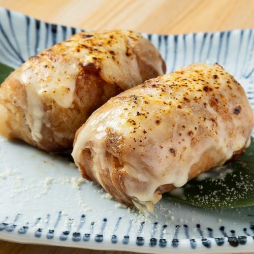 2 meat-wrapped rice balls (cheese)