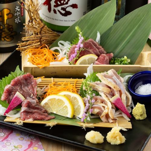 A luxurious assortment of beef, horse and chicken sashimi