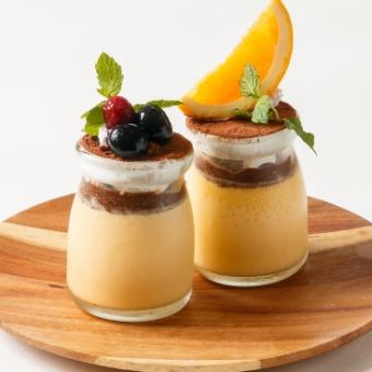 Thick tiramisu pudding topped with seasonal fruits