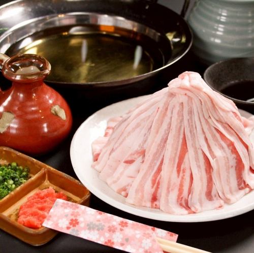 Beautifully stacked, extremely thin slices of pork.A blissful melt-in-your-mouth experience.
