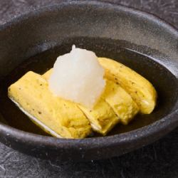 Truffle-scented rolled egg