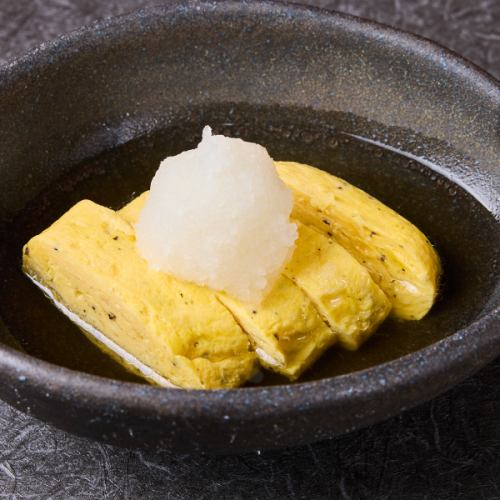 Truffle-scented rolled egg