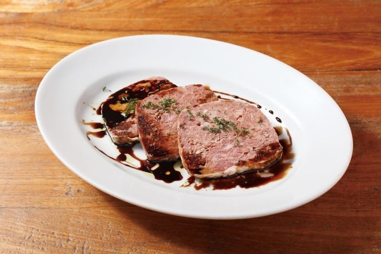 Meat terrine with balsamic sauce