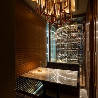 A VIP room with an adult atmosphere, set against the backdrop of a striking wine cellar